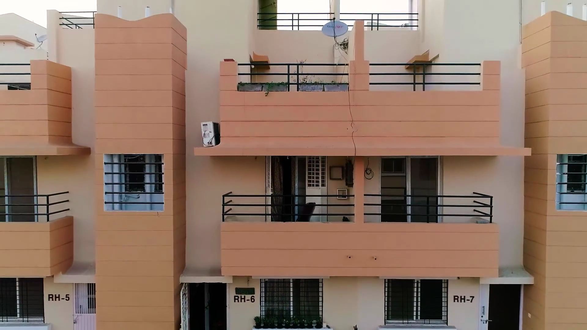 Row House Architectural Facade & Private Balconies